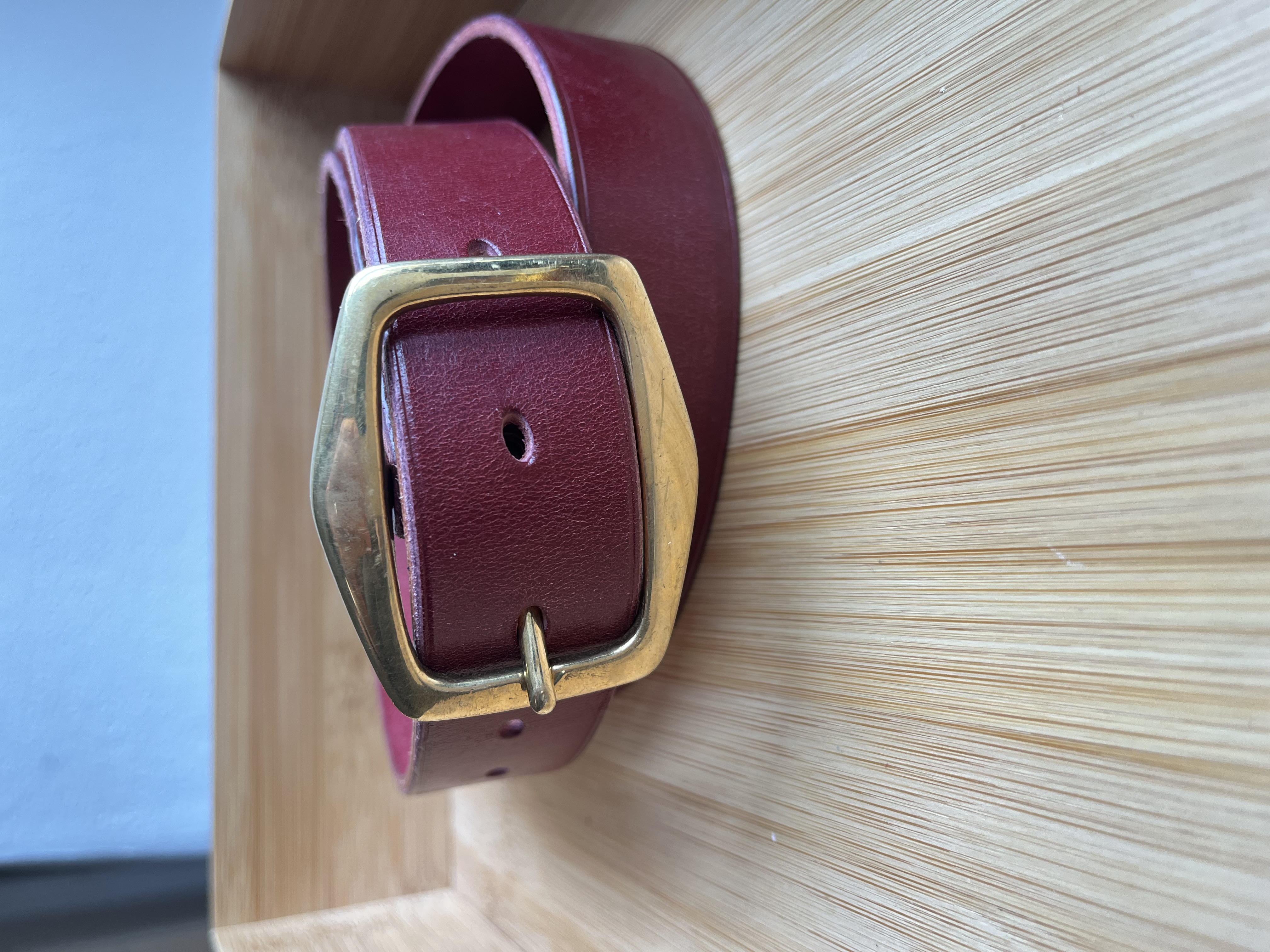 Rich red leather belt showing colour range